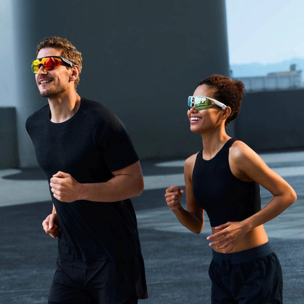 Two runners wearing BleeqUp Ranger AI sports camera glasses