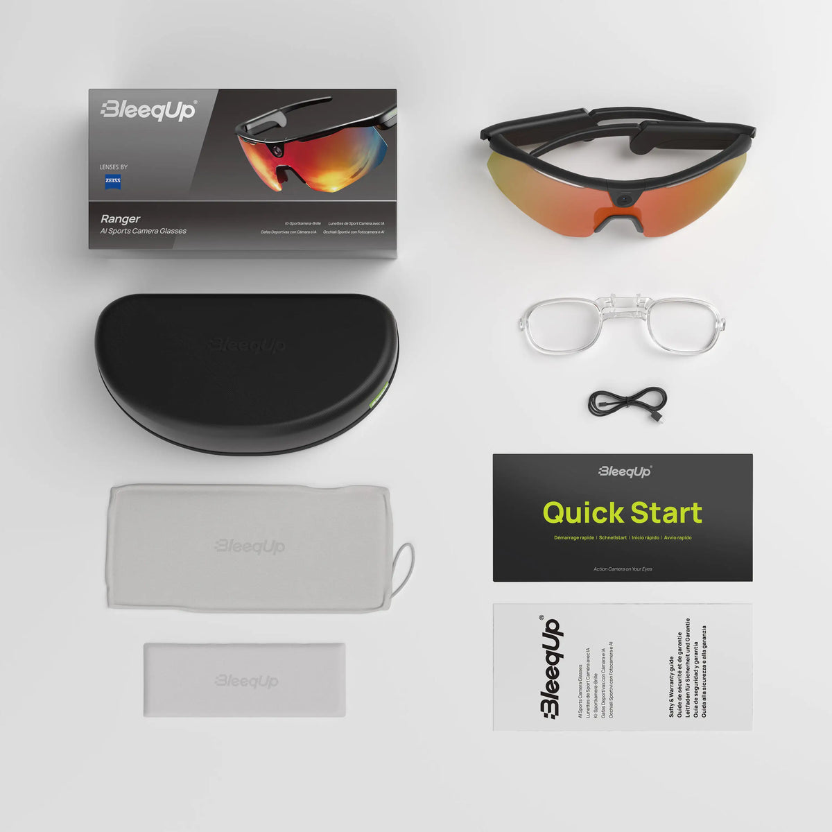 BleeqUp Ranger AI sports camera glasses package contents with case, prescription insert and charging cable